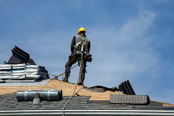 Professional Roof Replacement technician working in Miami, OK